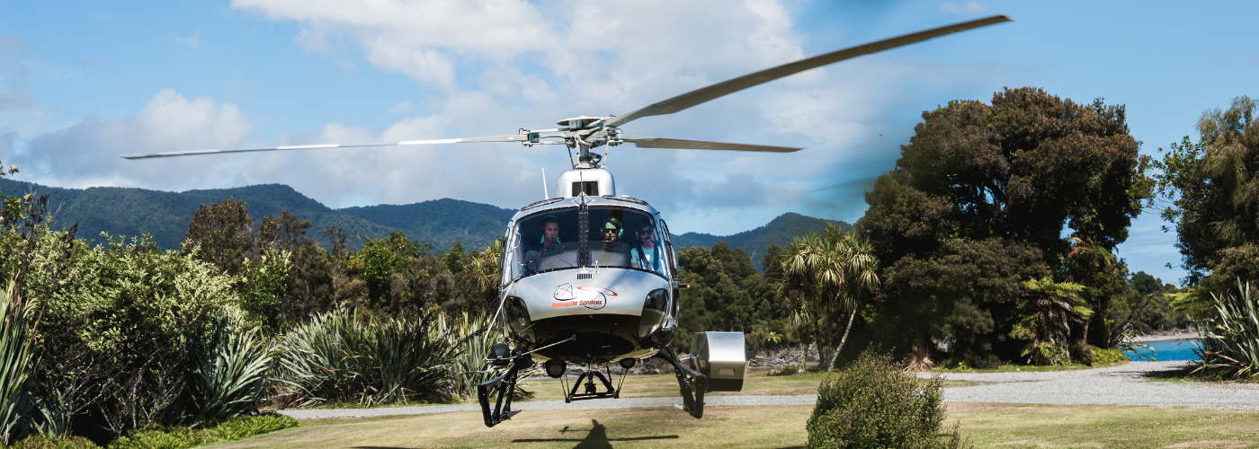 Heli taking off at Waitai Lodge