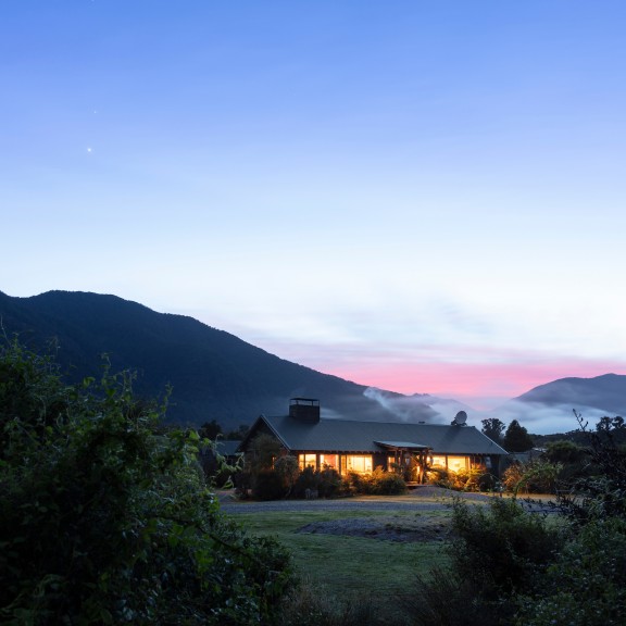 Hollyford external lodge dusk