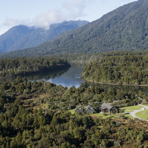 Hollyford River with native bush and mountains